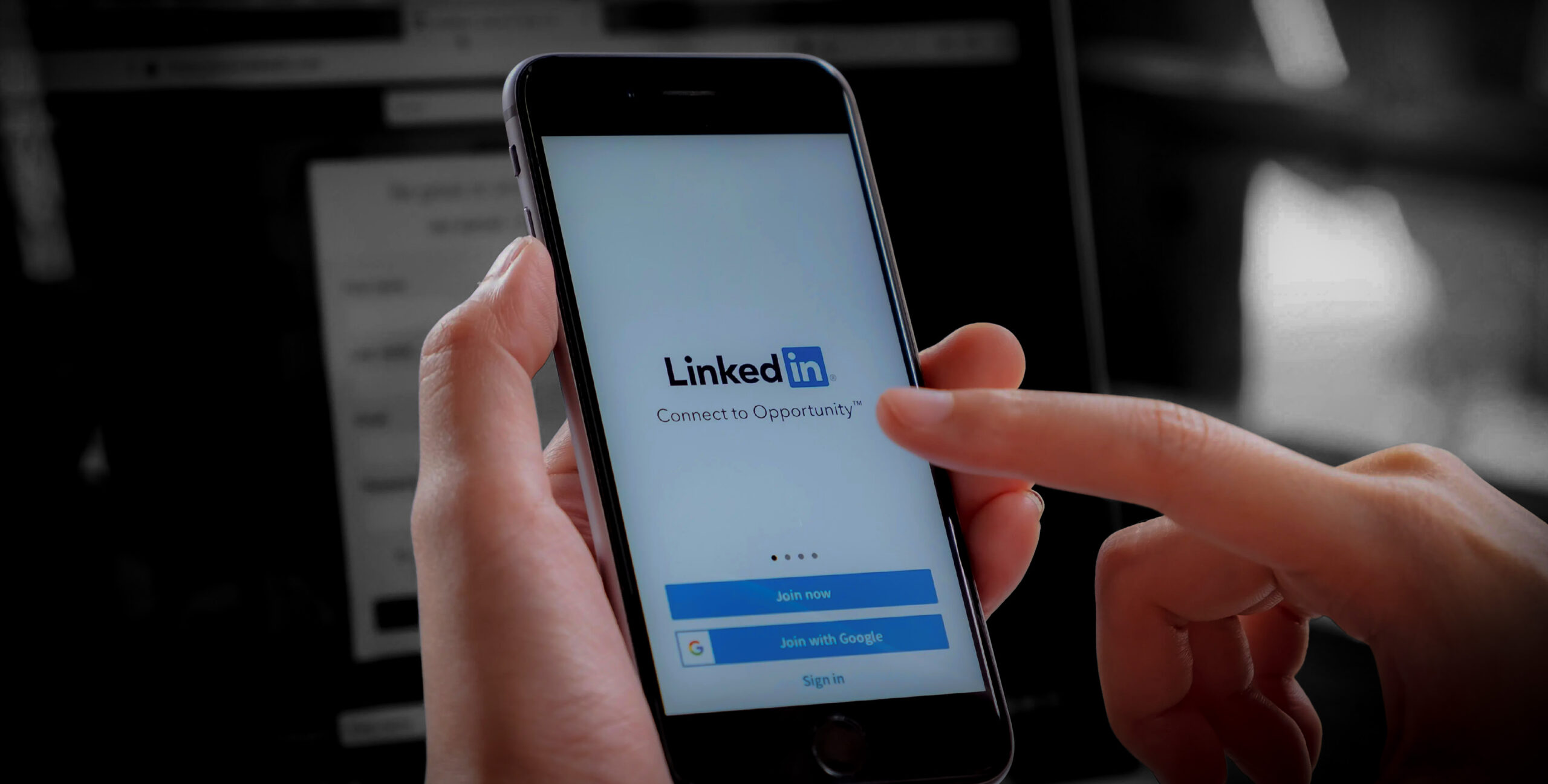 Smartphone showing LinkedIn sign-in, real estate lead generation tool