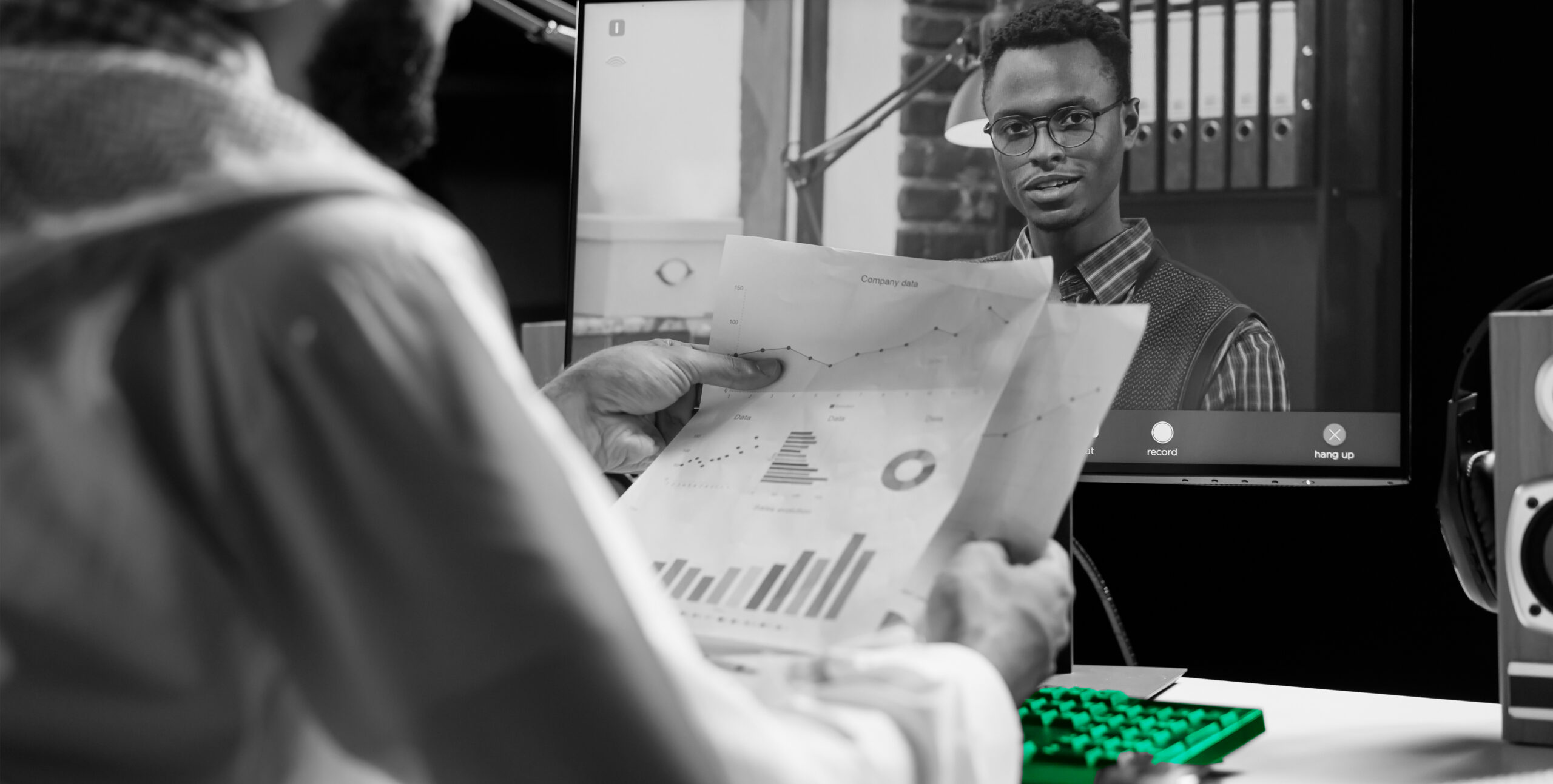 Colleague on a video call reviewing data charts