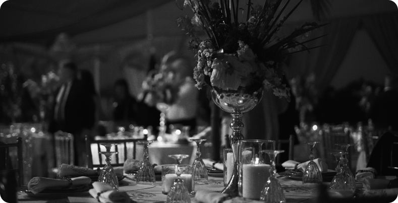 Event table setting with florals, real estate launch event