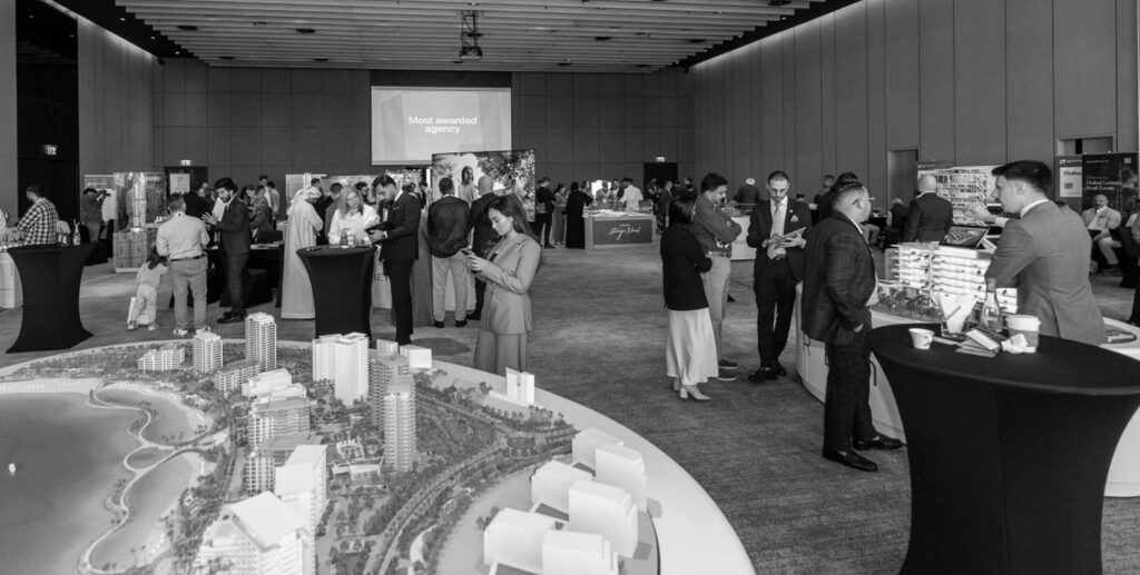 Guests browsing real estate exhibition hall