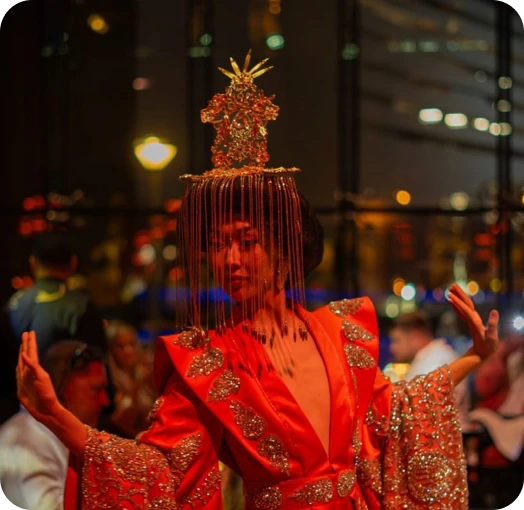 Performer in red festive costume