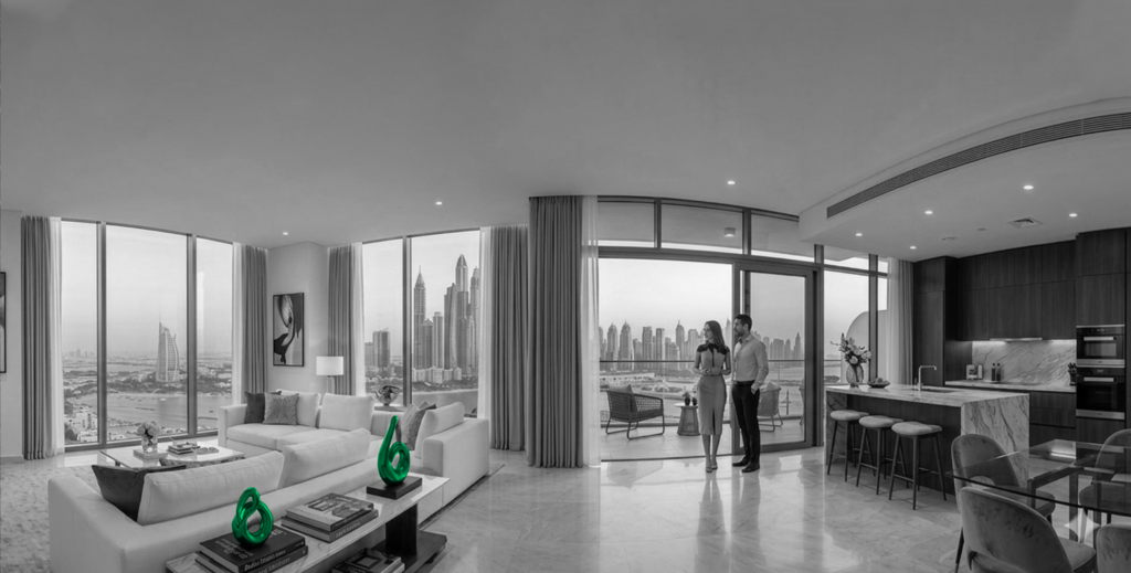 Couple on a Dubai Marina balcony, luxury real estate lifestyle marketing